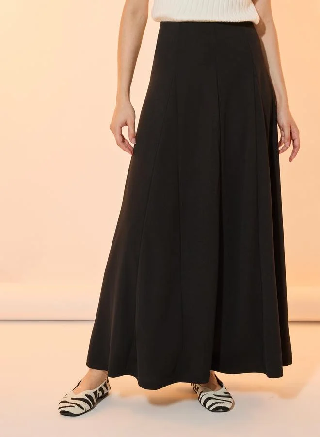 تايك تو تنورة طويلة سادة بحافة واسعة